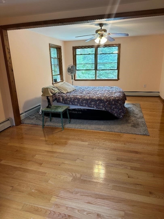 99 Old Poor Farm Road Ware, MA 01082 - Photo 22 of 29 a bedroom with a bed and a window