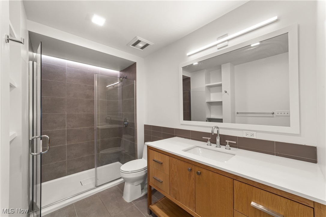 2048 Fulton Road, Unit 107 Cleveland, OH 44113 - Photo 31 of 37 Large bathroom with sleek finishes and lots of countertop space