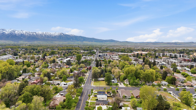 215 East 300 South Logan, UT 84321 - Photo 30 of 32 Aerial perspective of suburban area featuring mountains