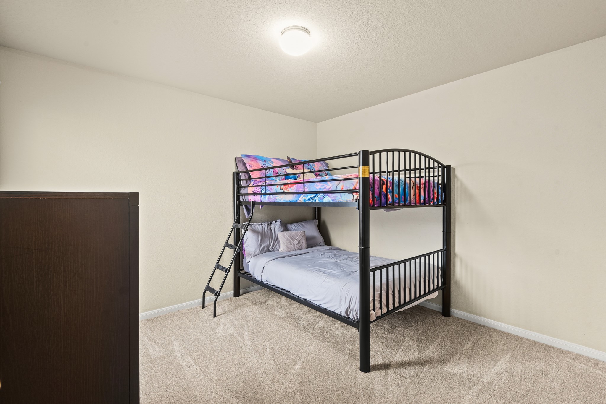 5211 Cayenne Lane Baytown, TX 77521 - Photo 13 of 19 Brand new carpet is in both of the secondary bedrooms.