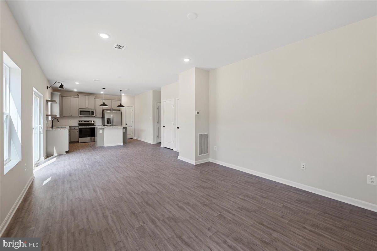 201 Whimbrel Road Hedgesville, WV 25427 - Photo 19 of 29 Similar Great room/ kitchen