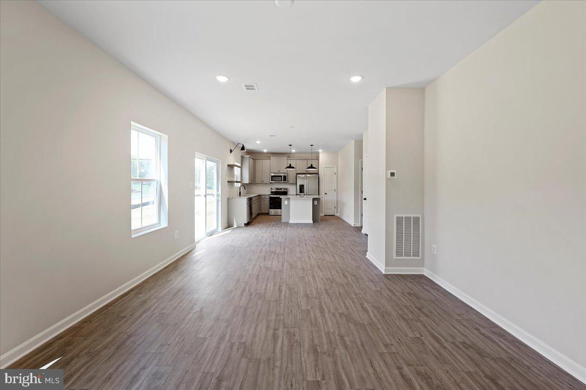 201 Whimbrel Road Hedgesville, WV 25427 - Photo 25 of 29 Similar Great Room Kitchen
