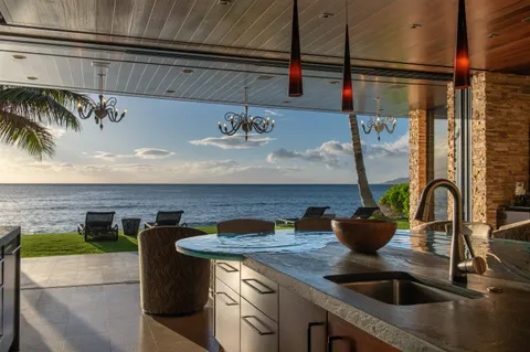 a kitchen with a sink and a stove