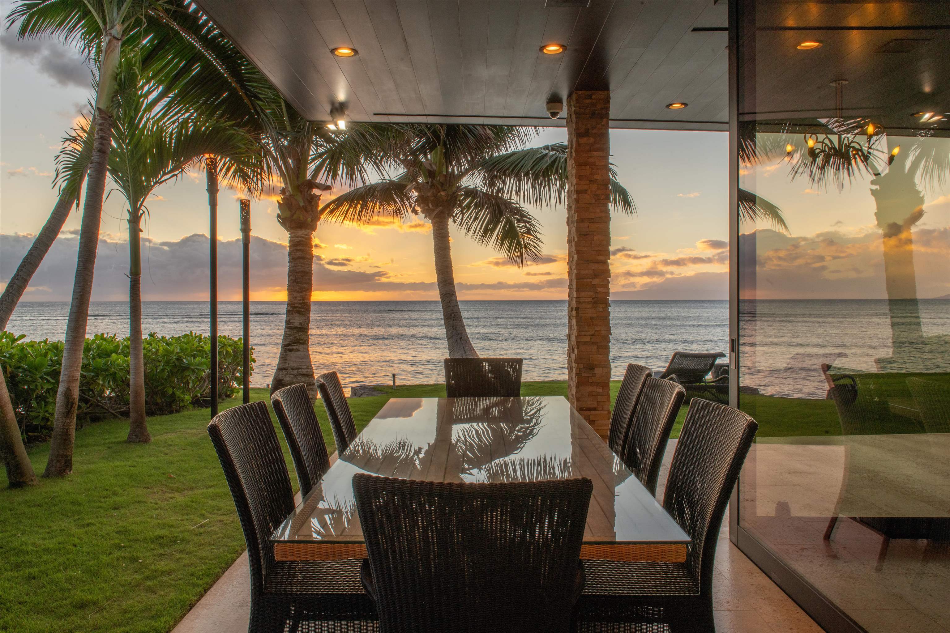 1750 Halama Street Kihei, HI 96753 - Photo 15 of 50 a view of a chairs and table in patio with swimming pool