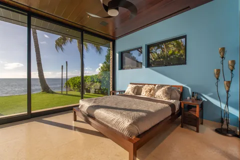 a view of a glass door with a yard