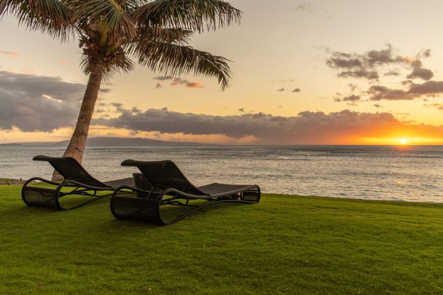 a view of a lake with a car parked
