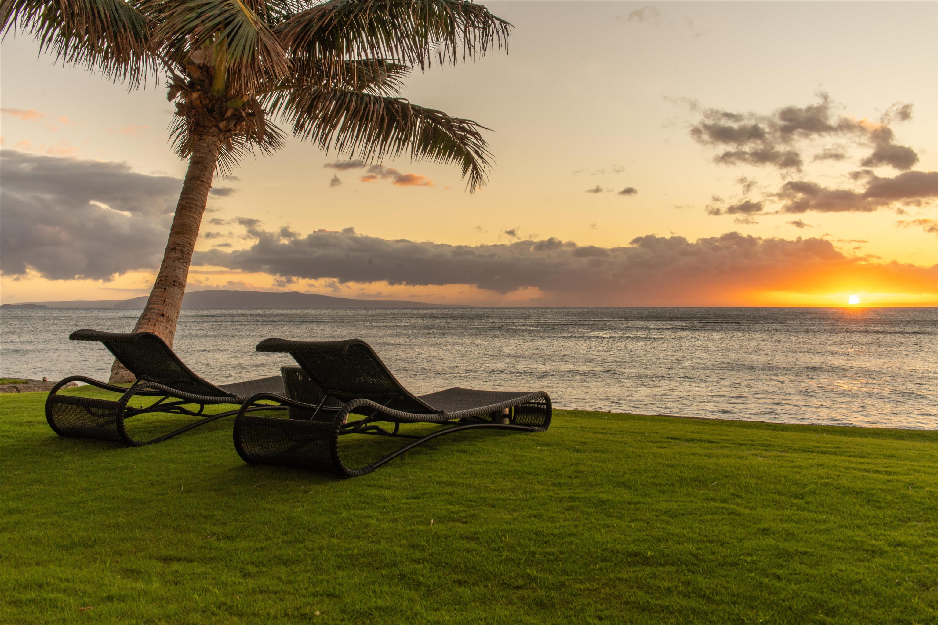 1750 Halama Street Kihei, HI 96753 - Photo 2 of 50 a view of a lake with a car parked