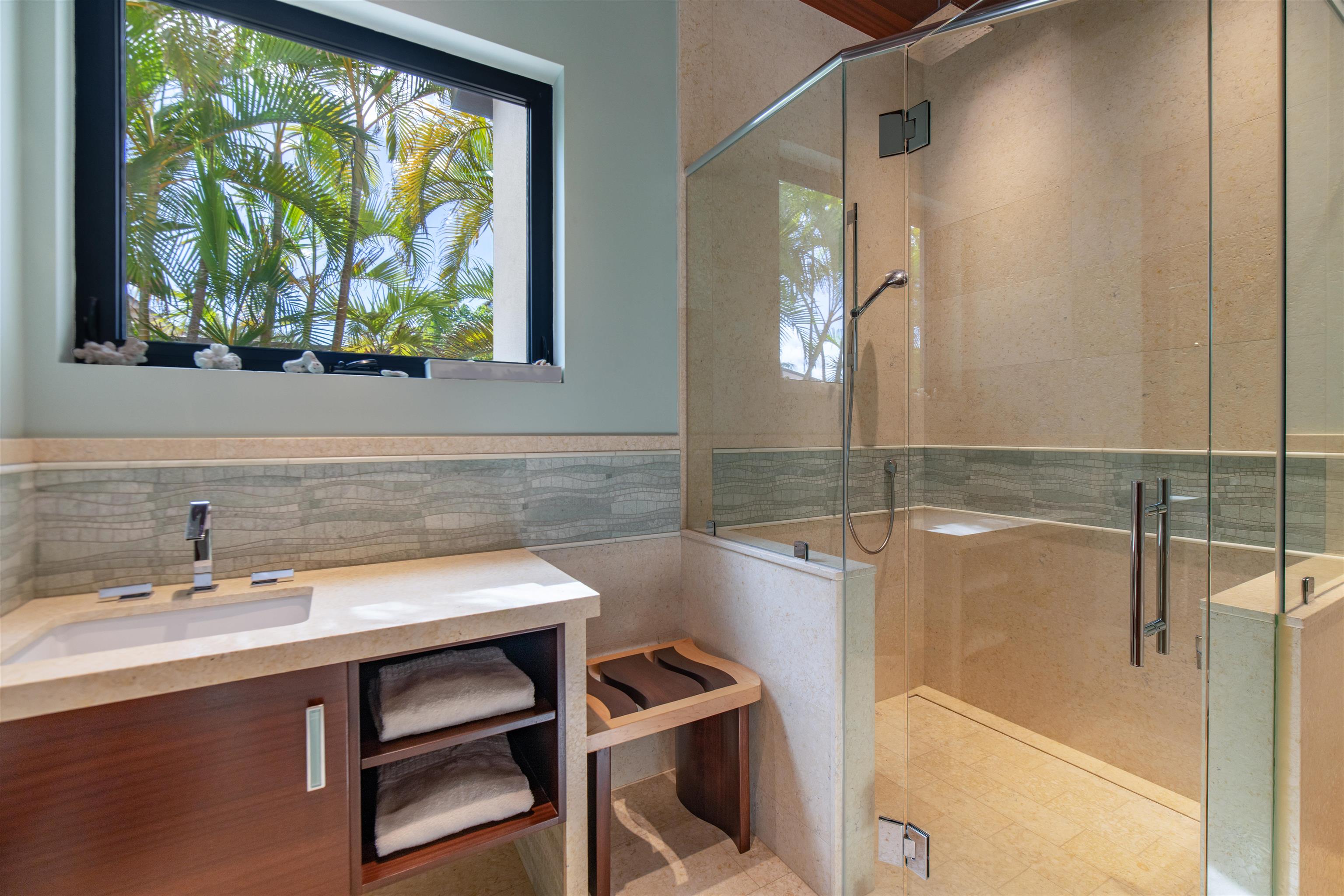 1750 Halama Street Kihei, HI 96753 - Photo 37 of 50 a bathroom with a sink and a mirror