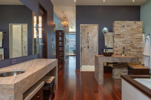 a bedroom with a bed and a table in it