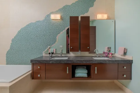 an aerial view of a house with garden space and plants