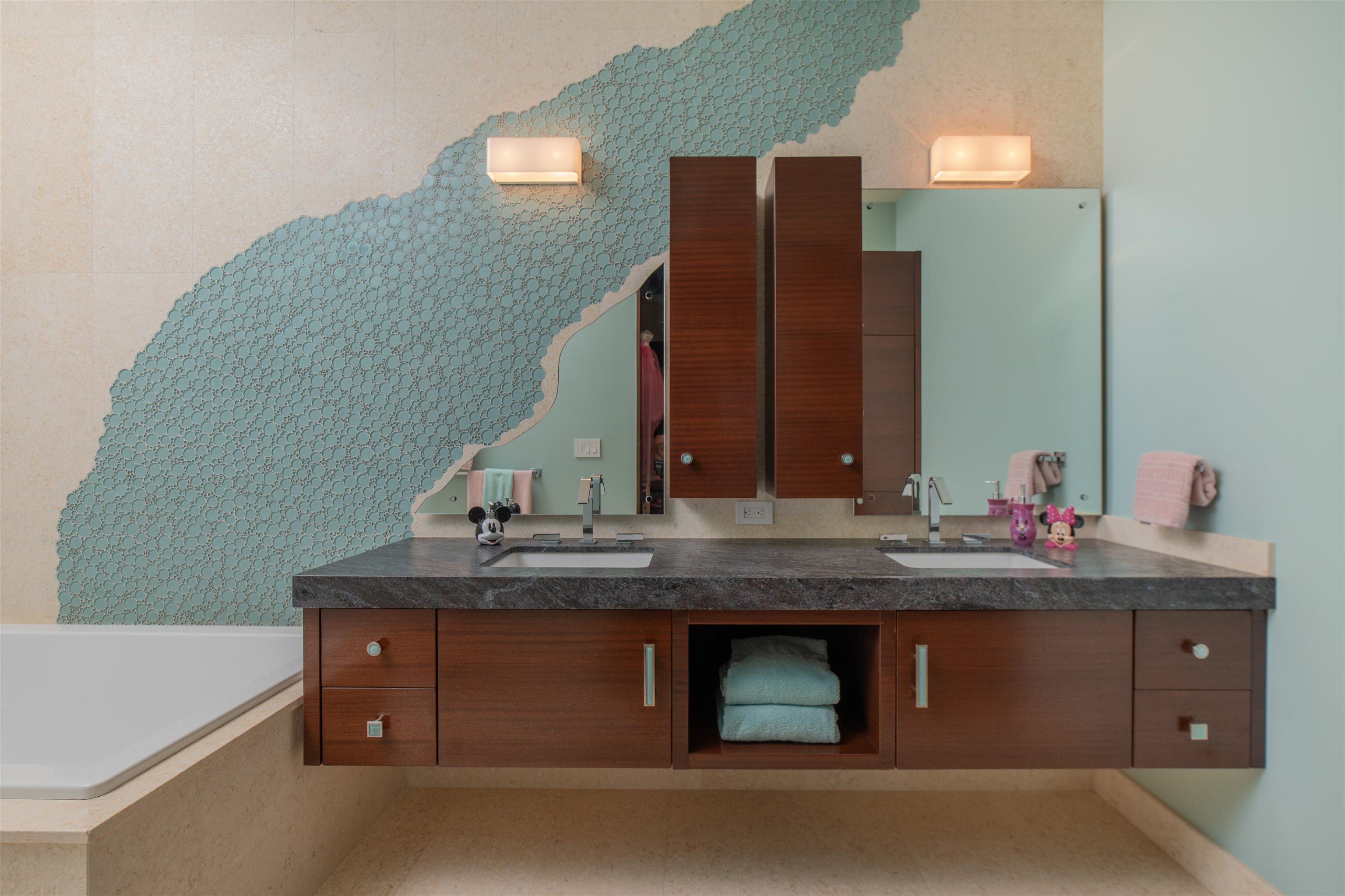 1750 Halama Street Kihei, HI 96753 - Photo 46 of 50 a bathroom with a granite countertop sink and a mirror