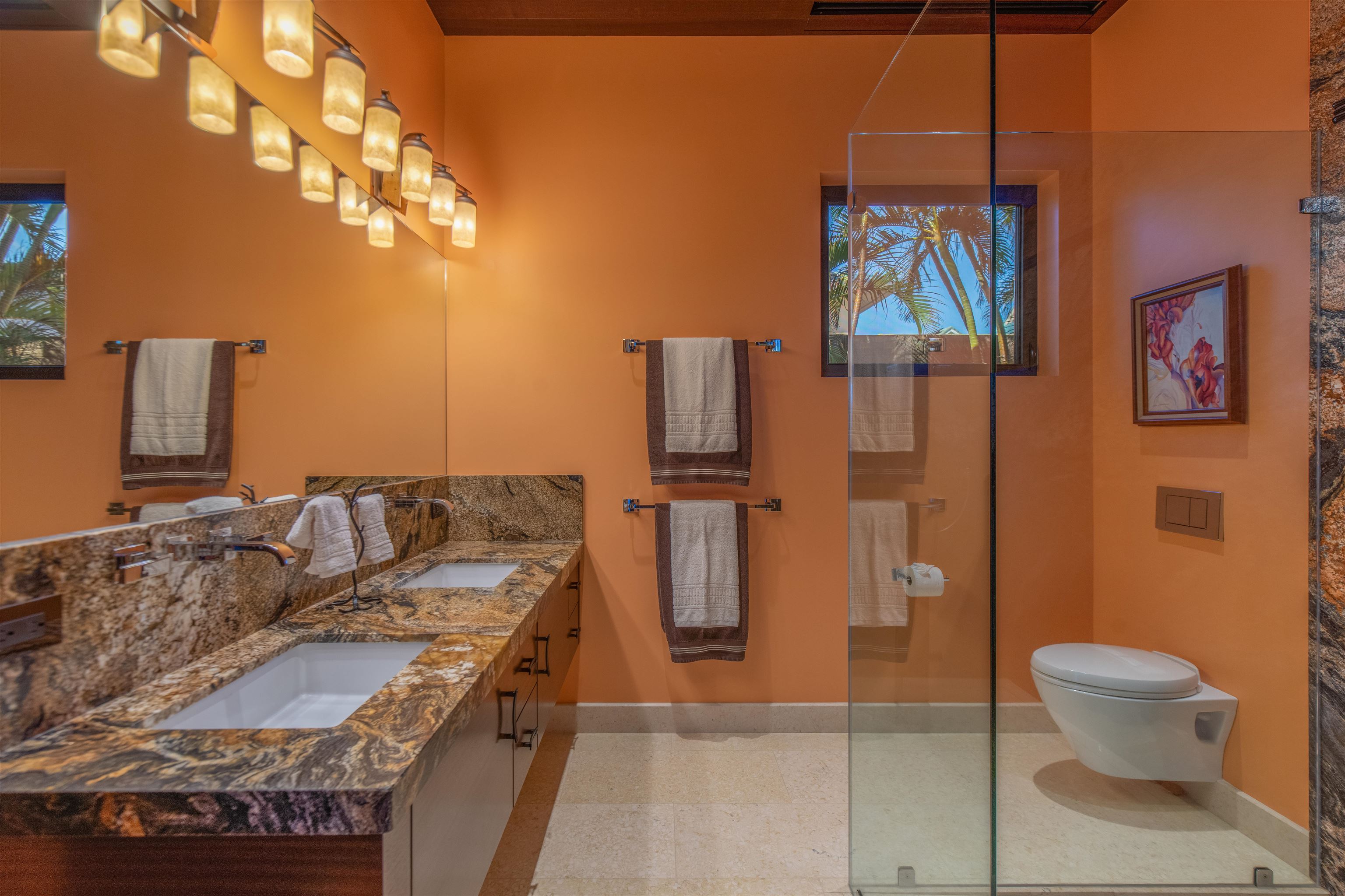 1750 Halama Street Kihei, HI 96753 - Photo 47 of 50 a living room with furniture and a painting on the wall