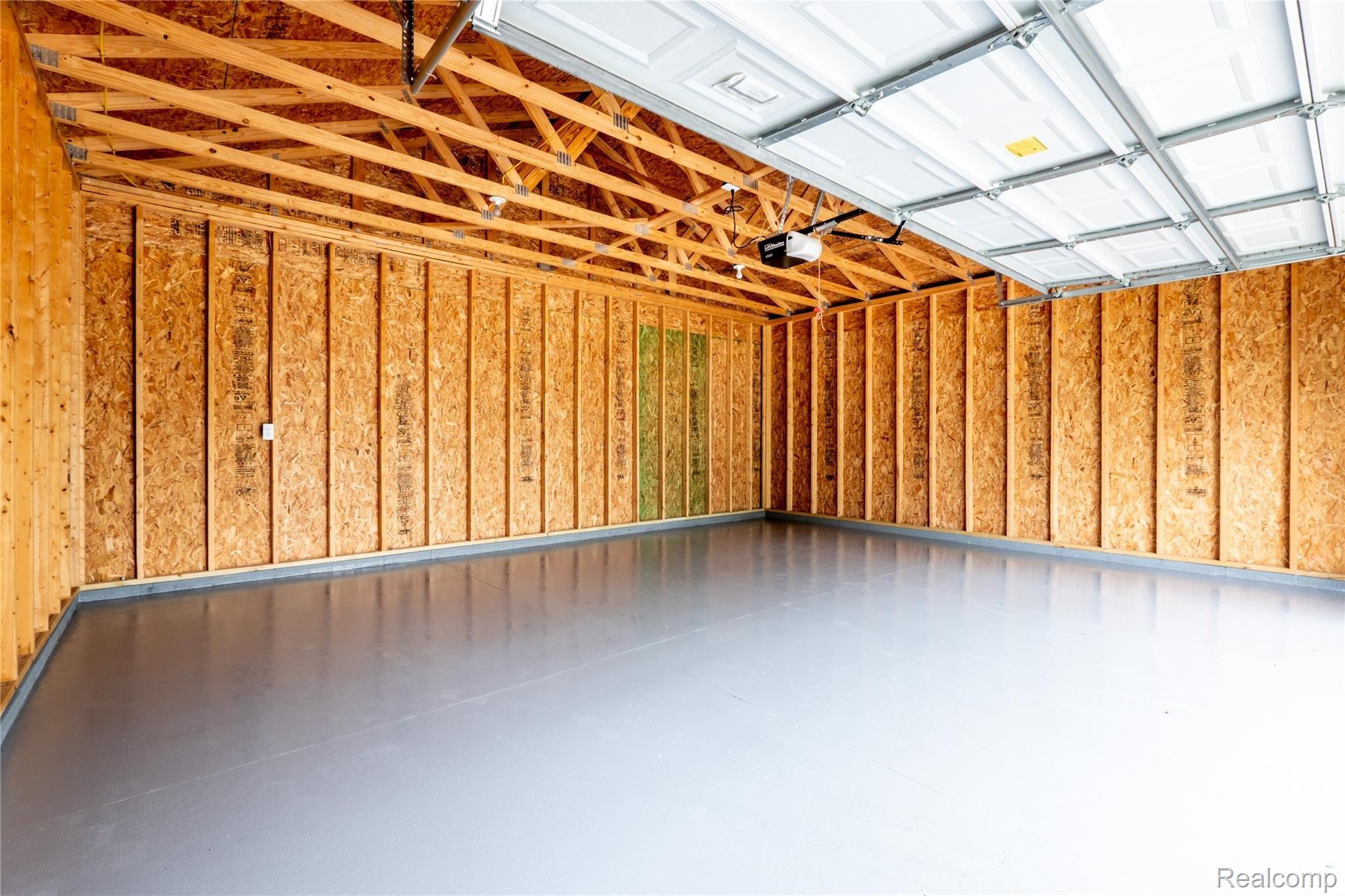 6 Hanover Road Pleasant Ridge, MI 48069 - Photo 28 of 36 2.5 car garage with epoxy finish on the floor.