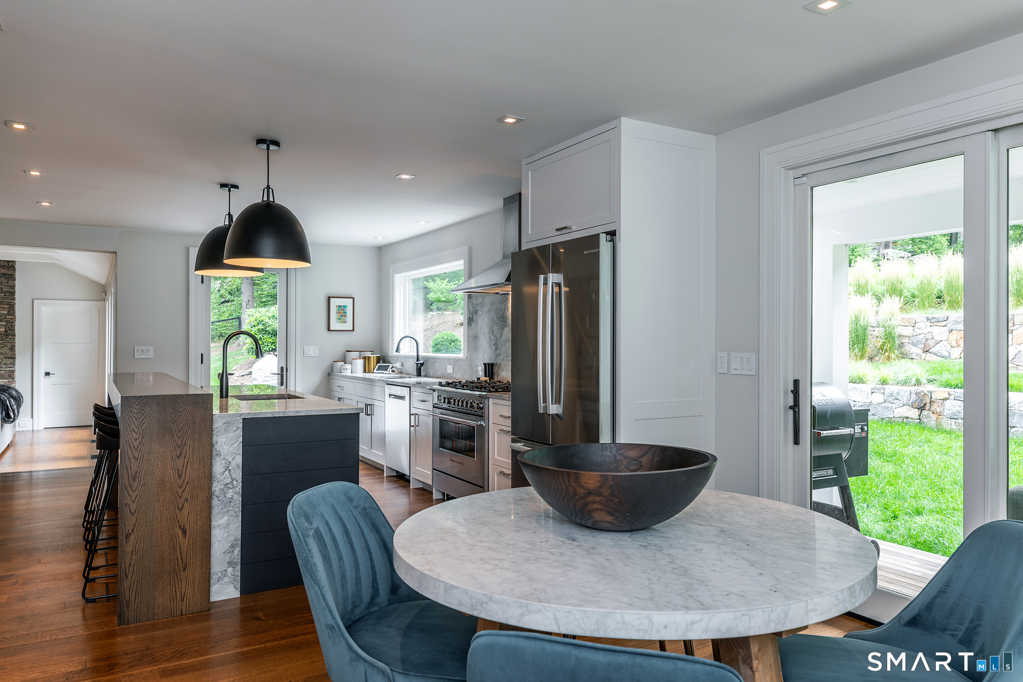 176 Apple Lane Roxbury, CT 06783 - Photo 6 of 24 a view of a dining room with furniture window and wooden floor