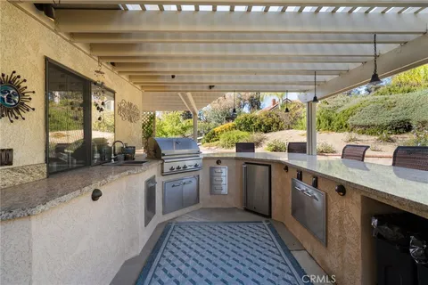 a spacious bathroom with a granite countertop tub and a sink
