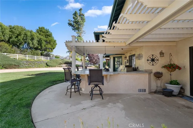 a view of a livingroom with furniture and a fireplace