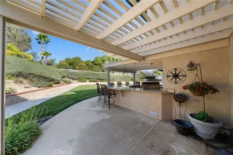 a view of a livingroom with furniture and a fireplace