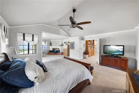 a living room with furniture a rug and a window