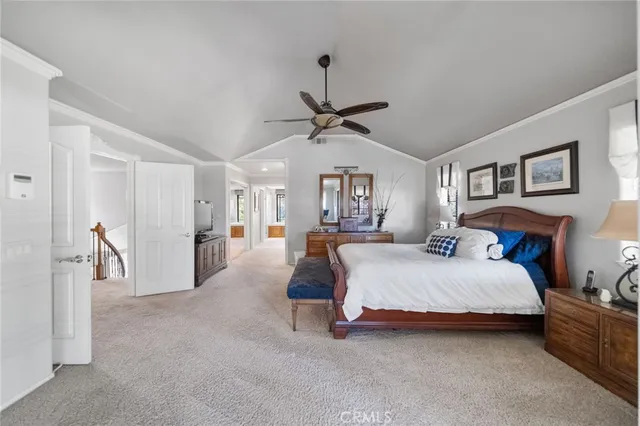 a kitchen with stainless steel appliances granite countertop a sink and a refrigerator