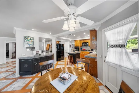an aerial view of a house with a swimming pool
