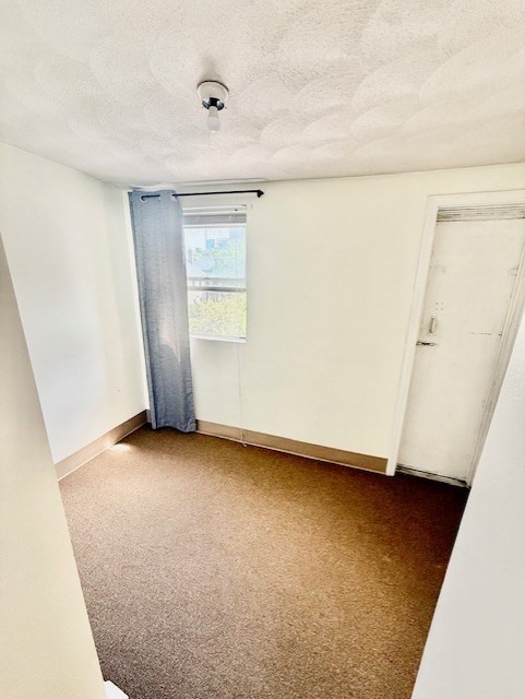 540 Cambridge Street, Unit 3 Cambridge, MA 02141 - Photo 11 of 13 a view of an empty room with a window