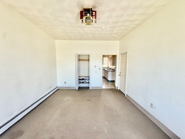 540 Cambridge Street, Unit 3 Cambridge, MA 02141 - Photo 6 of 13 a view of a room with a utility room