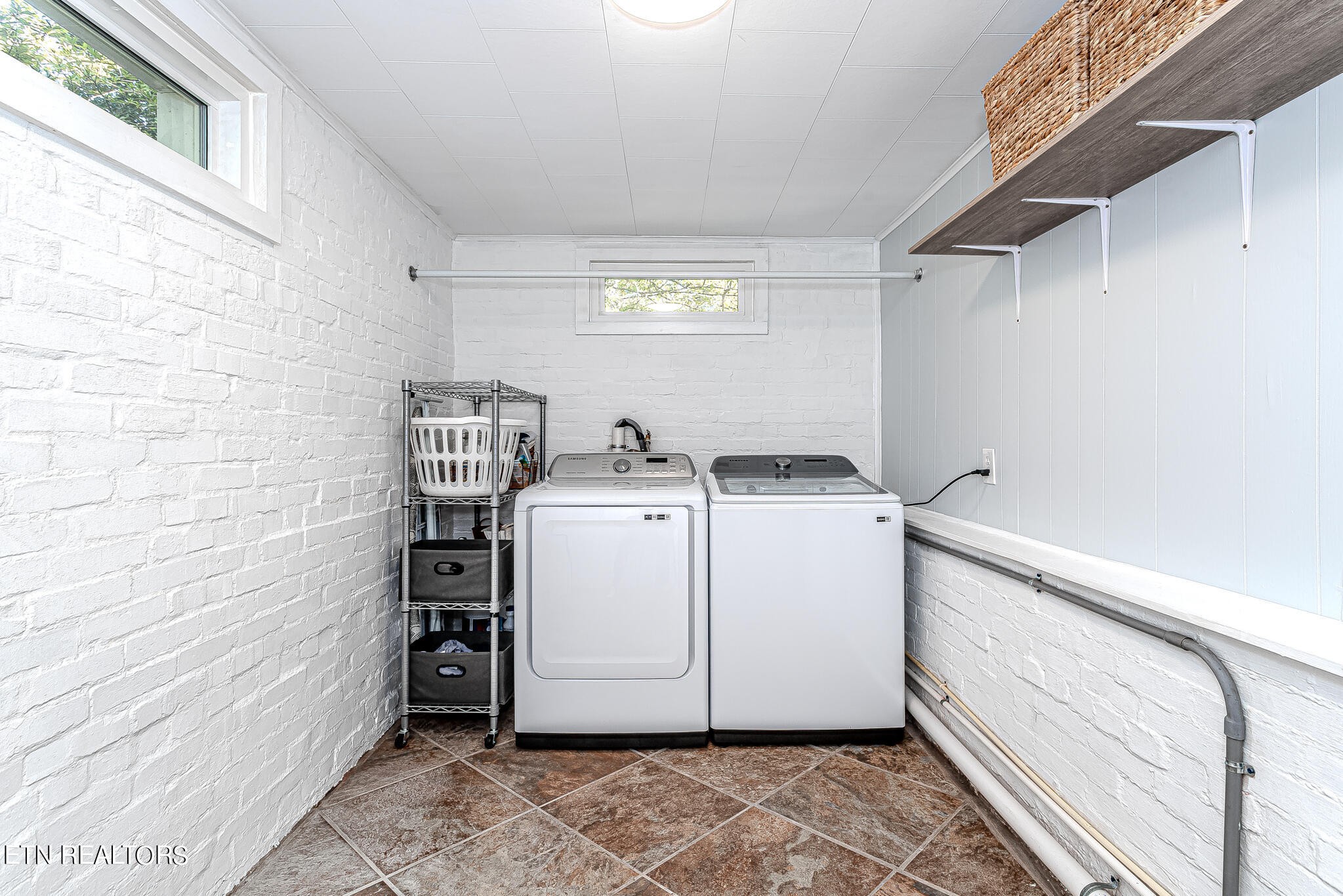91 Orchard Road Norris, TN 37828 - Photo 23 of 54 a utility room with dryer and washer