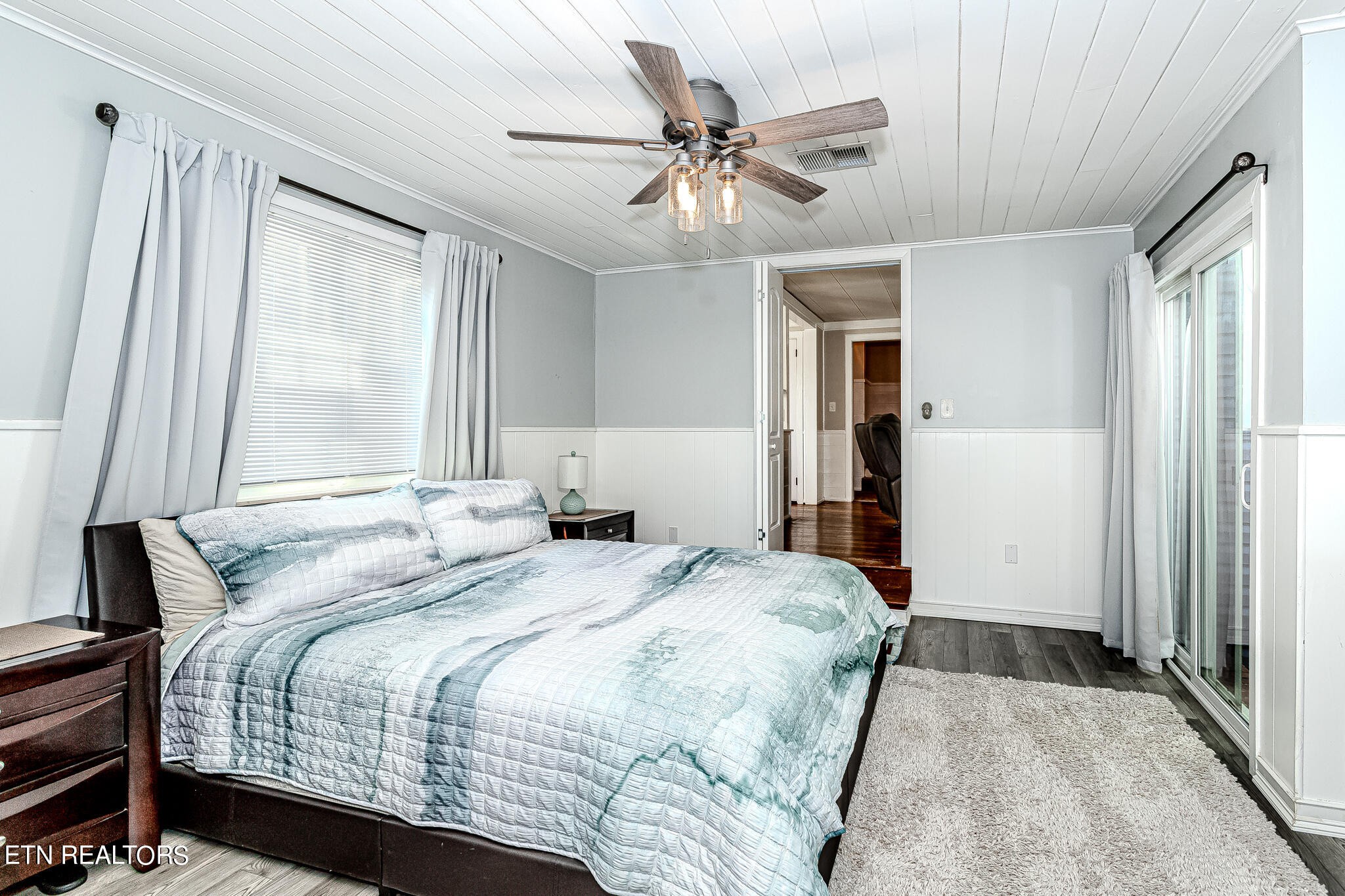 91 Orchard Road Norris, TN 37828 - Photo 25 of 54 a bedroom with a bed and a window