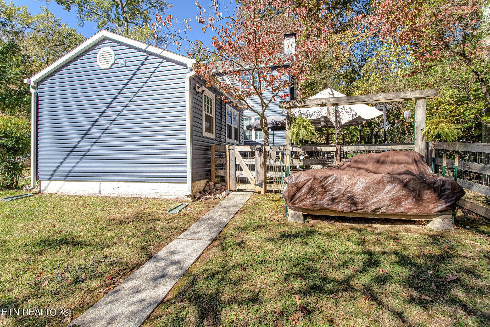91 Orchard Road Norris, TN 37828 - Photo 47 of 54 a view of a backyard of the house