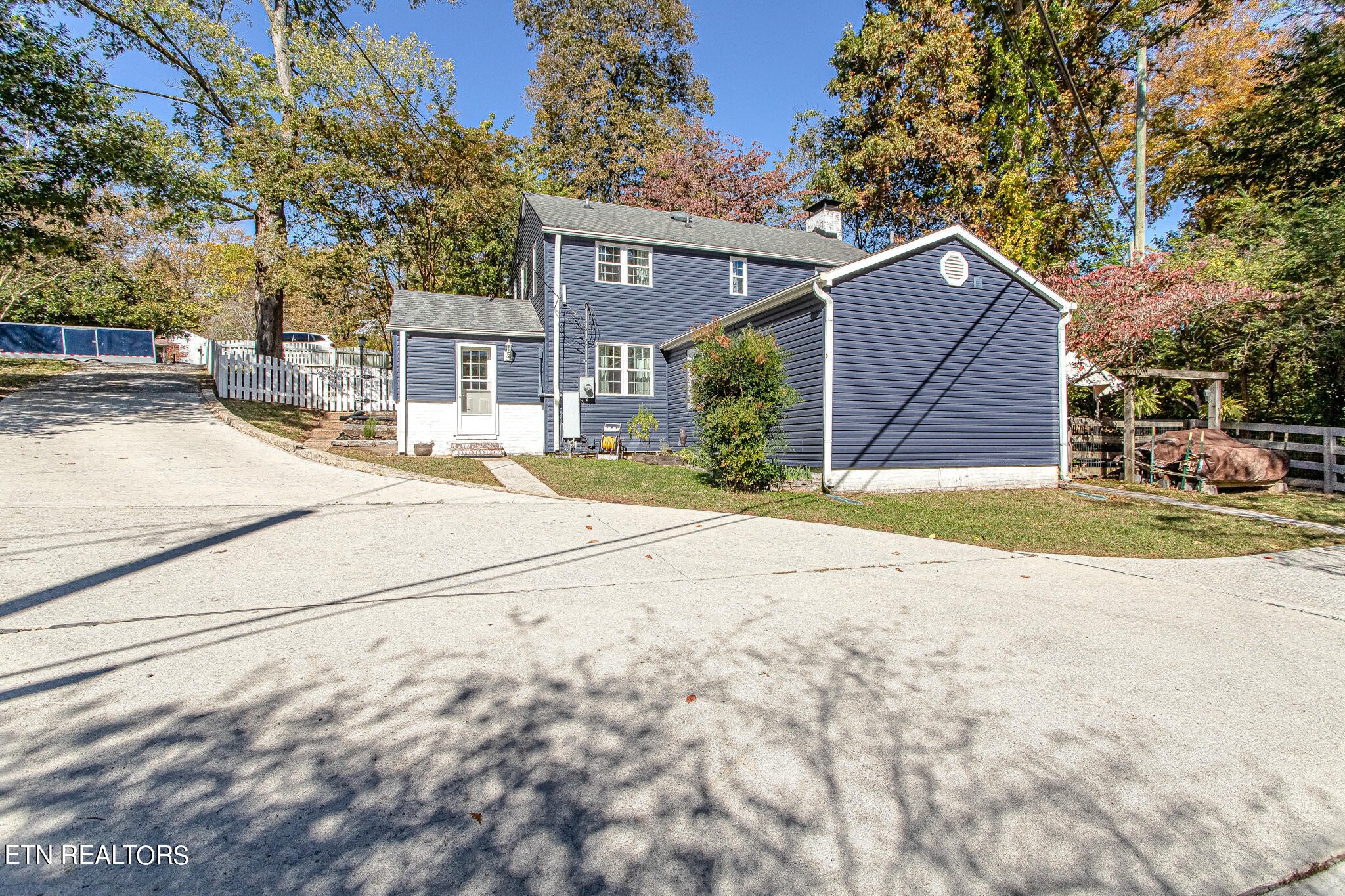 91 Orchard Road Norris, TN 37828 - Photo 5 of 54 a view of a house with a yard