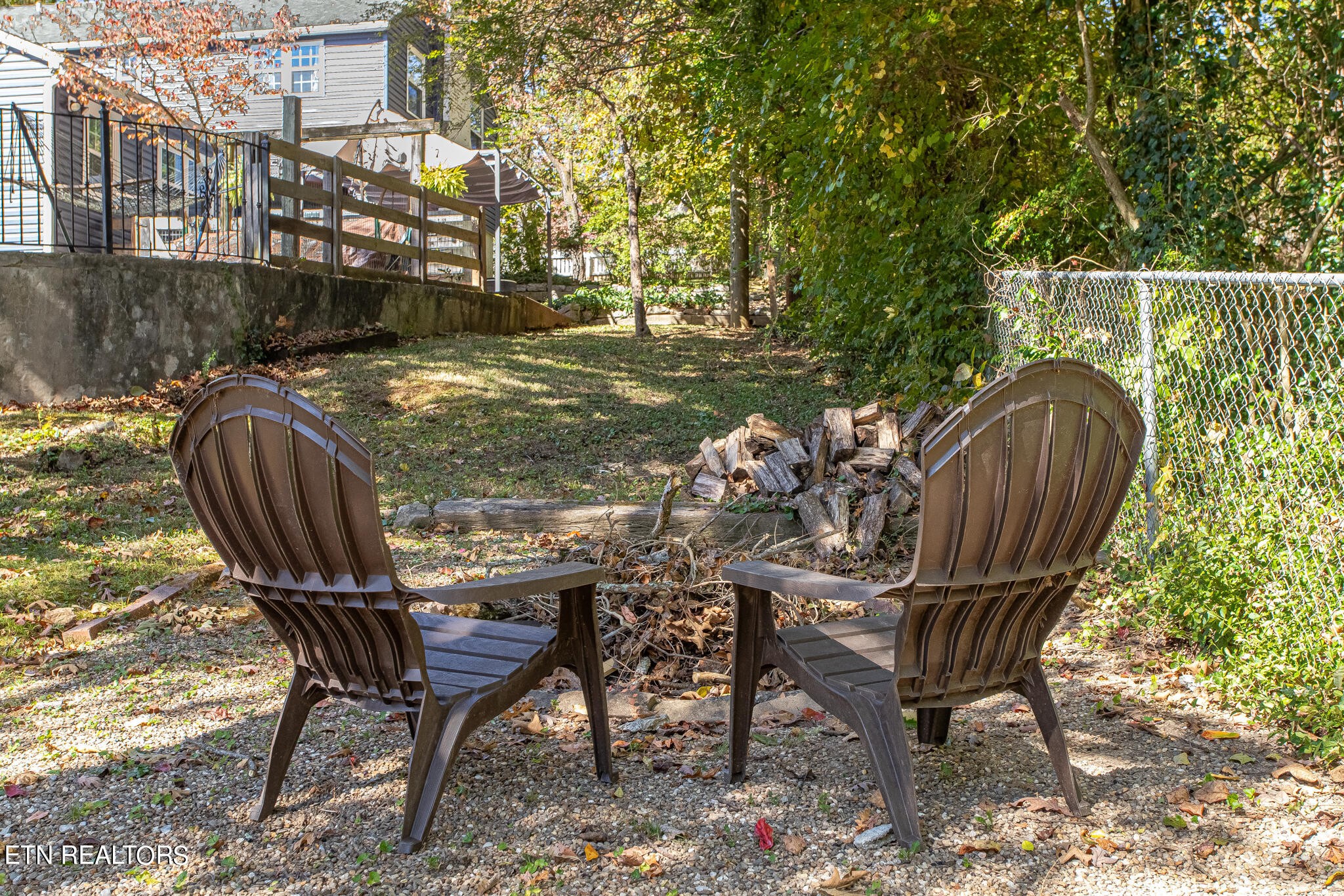 91 Orchard Road Norris, TN 37828 - Photo 53 of 54 a view of a chairs and table in the patio