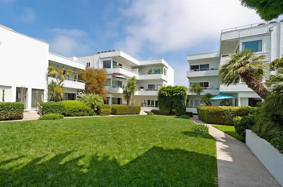 2358 Torrey Pines Road, Unit 19 La Jolla, CA 92037 - Photo 1 of 28 a front view of a house with a yard