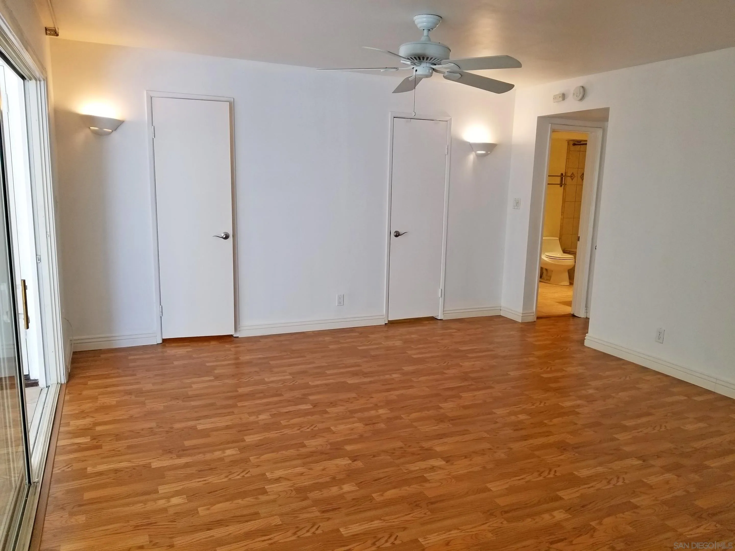 2358 Torrey Pines Road, Unit 19 La Jolla, CA 92037 - Photo 13 of 28 a view of an empty room with closet and a window