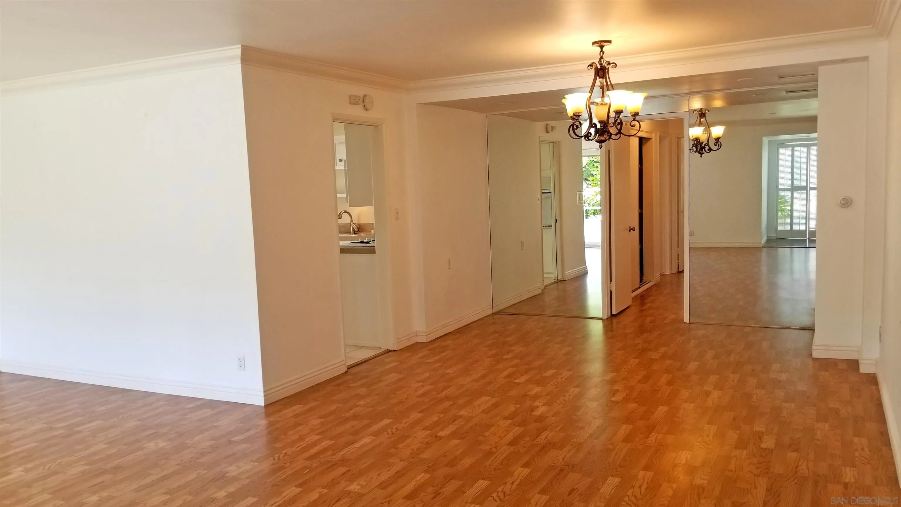 2358 Torrey Pines Road, Unit 19 La Jolla, CA 92037 - Photo 2 of 28 a view of a hallway with wooden floor