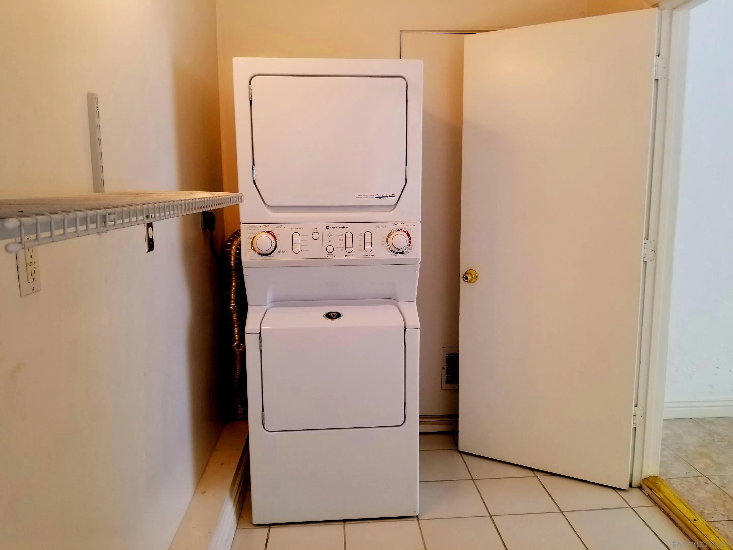 2358 Torrey Pines Road, Unit 19 La Jolla, CA 92037 - Photo 26 of 28 a utility room with dryer and washer