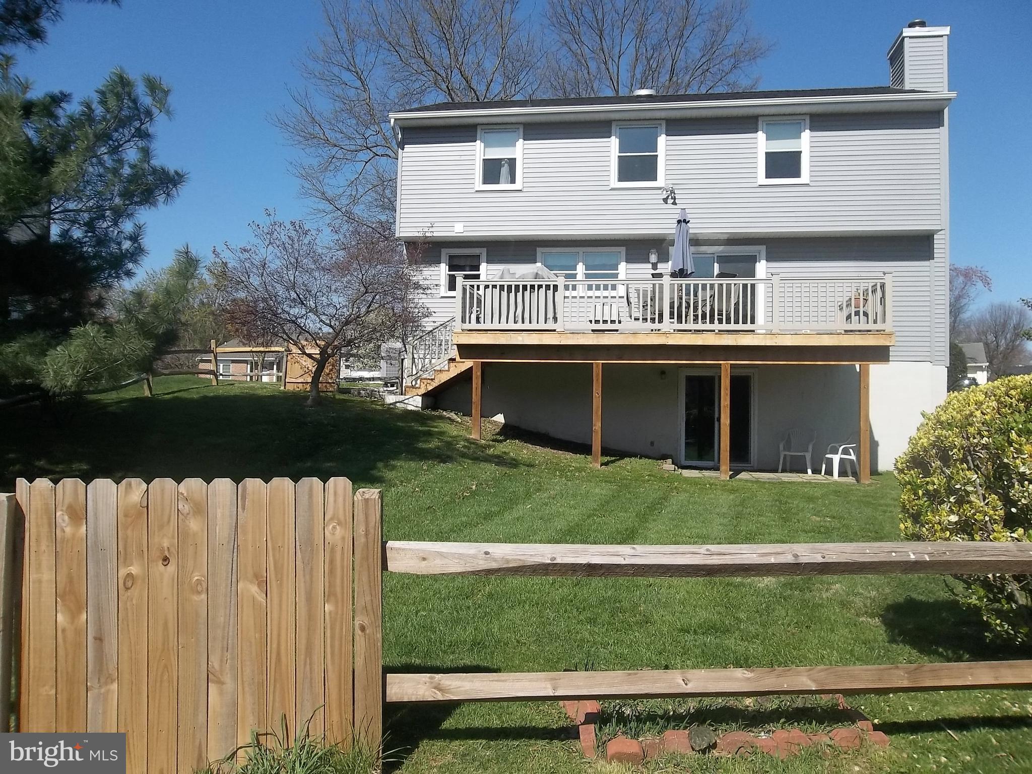9107 Bowline Road Baltimore, MD 21236 - Photo 16 of 19 a view of a house with a balcony