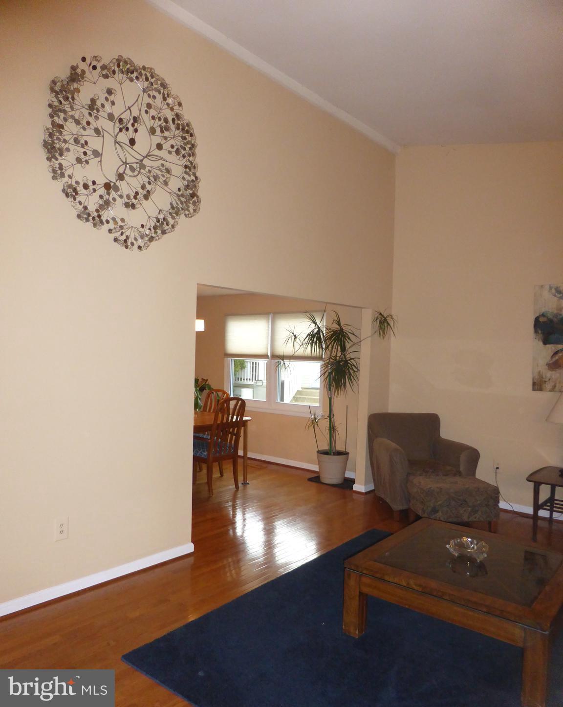 9107 Bowline Road Baltimore, MD 21236 - Photo 3 of 19 a living room with furniture and a large window