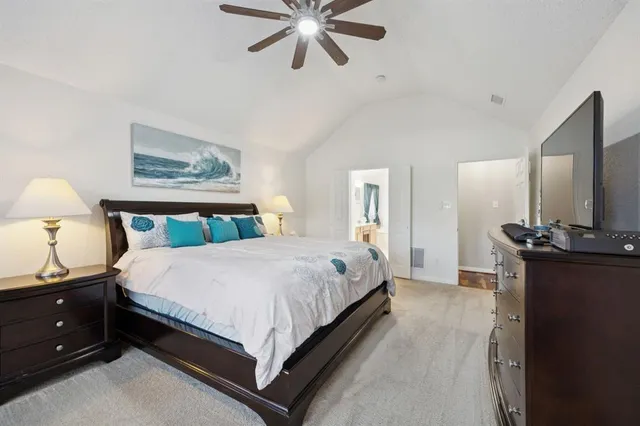 a spacious bathroom with a double vanity sink a mirror and a bathtub
