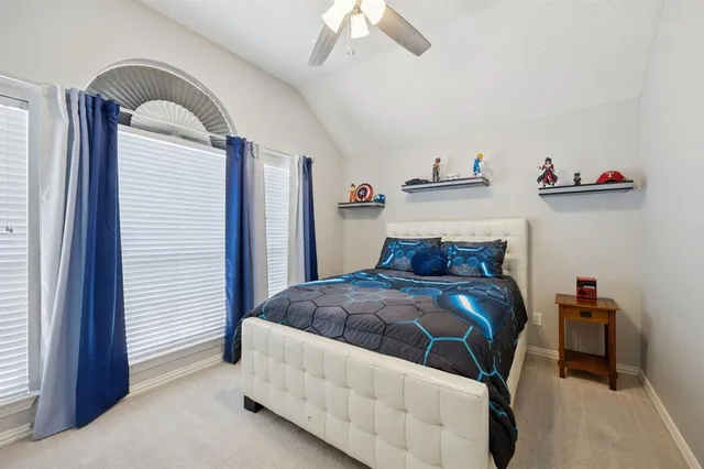 a bathroom with double sink and a mirror