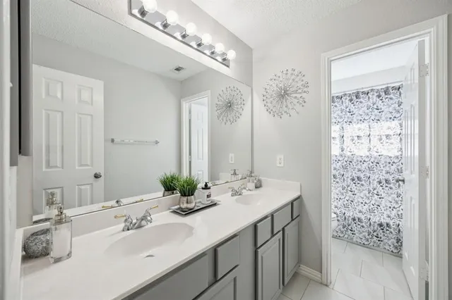 a view of a livingroom with workspace and a window