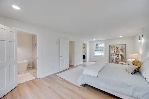 a bedroom with a bed and furniture