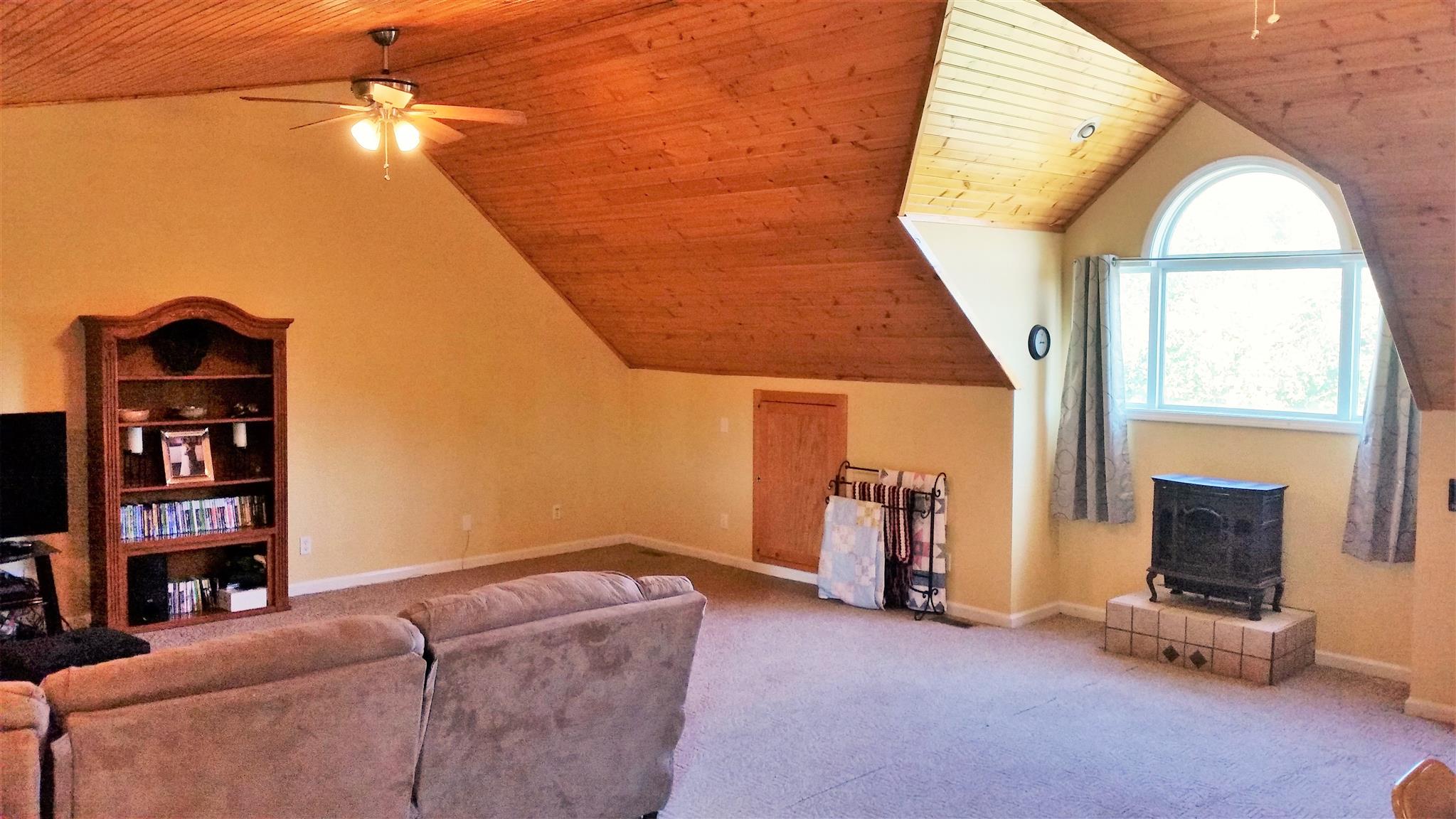 3718 Dobbin Road Springfield, TN 37172 - Photo 17 of 22 a living room with furniture and a fireplace