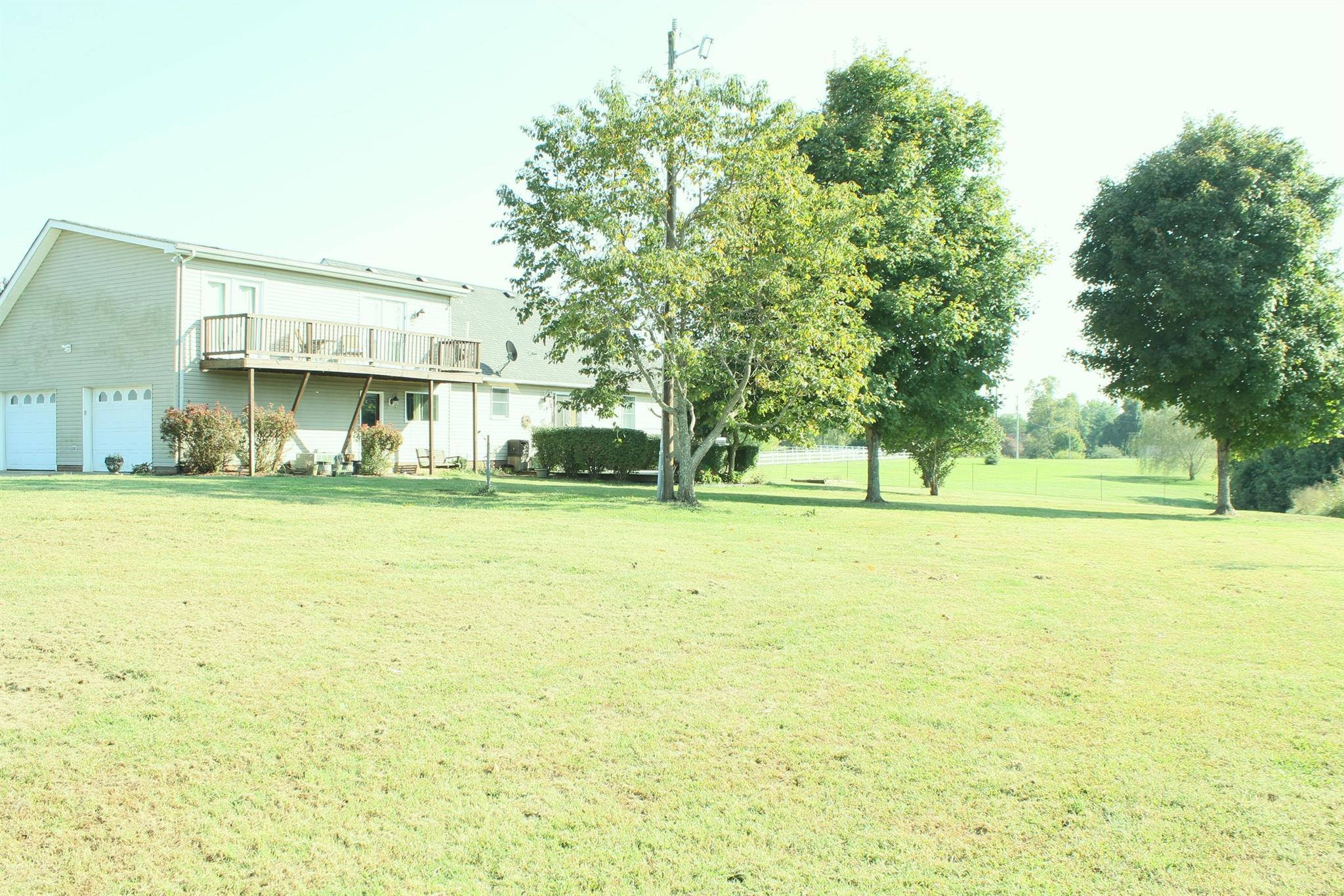 3718 Dobbin Road Springfield, TN 37172 - Photo 4 of 22 a view of a building with yard and trees