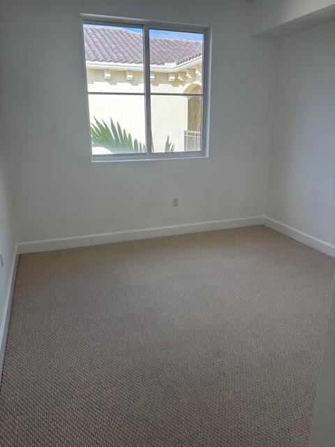 1420 Renaissance Way, Unit 420 Boynton Beach, FL 33426 - Photo 13 of 28 an empty room with a window