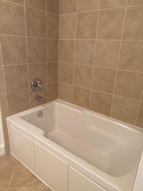 1420 Renaissance Way, Unit 420 Boynton Beach, FL 33426 - Photo 19 of 28 a bathroom with a bathtub