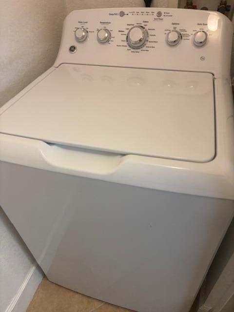 1420 Renaissance Way, Unit 420 Boynton Beach, FL 33426 - Photo 24 of 28 a close up view of washer and dryer