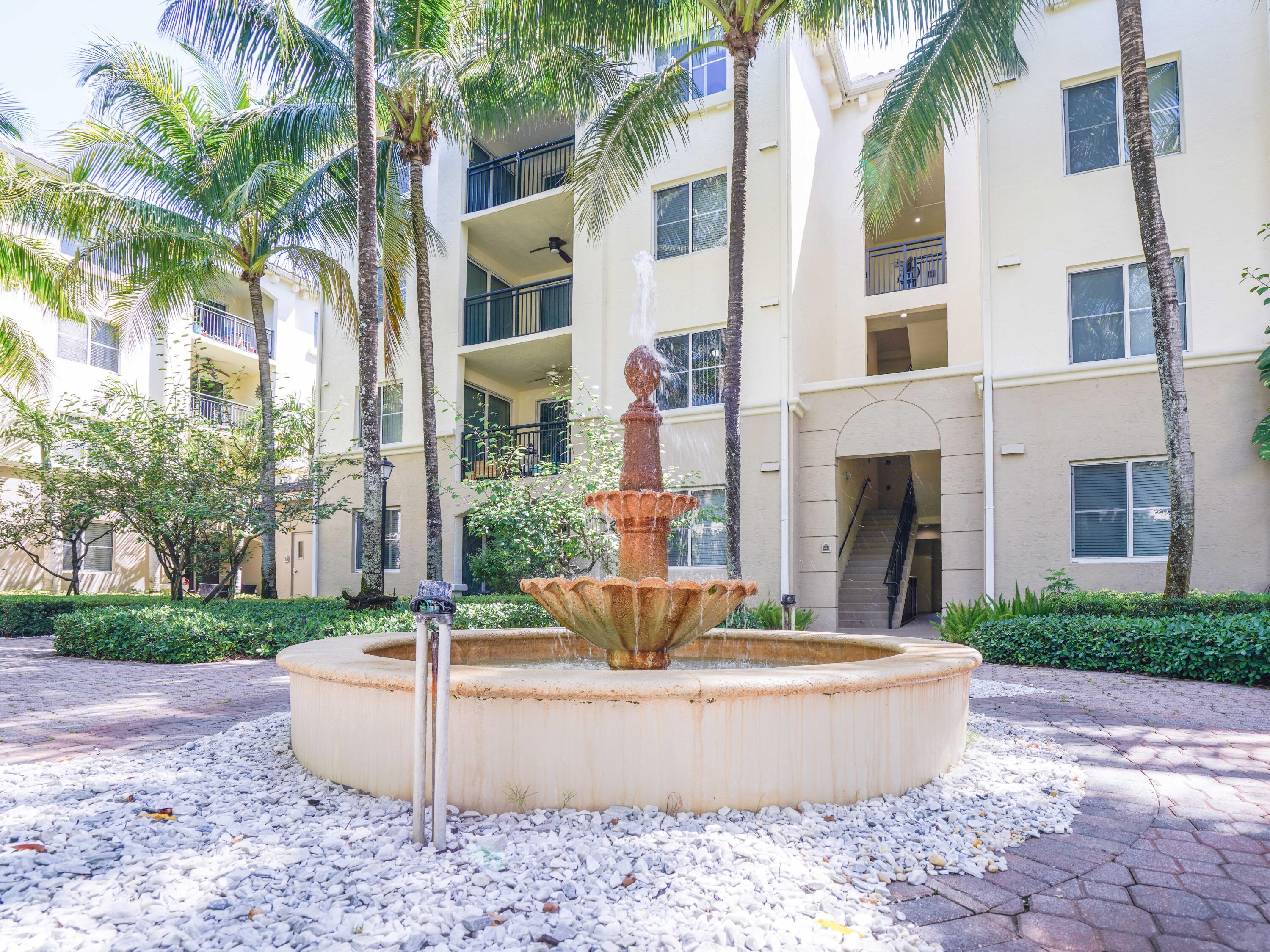 1420 Renaissance Way, Unit 420 Boynton Beach, FL 33426 - Photo 7 of 28 a view of a white tub sitting in middle of a yard