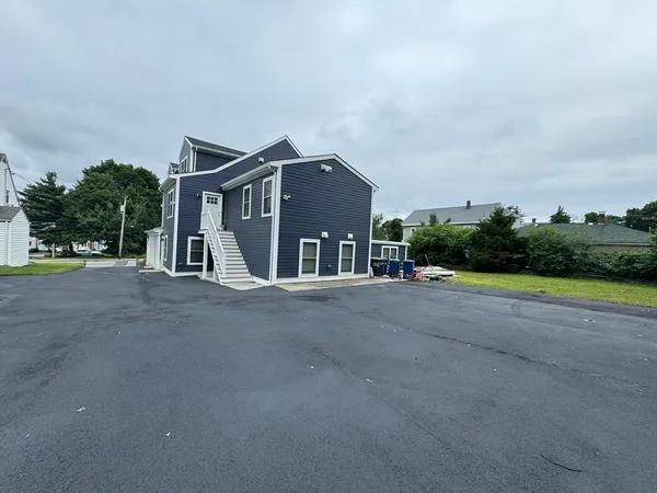 a view of house with a street