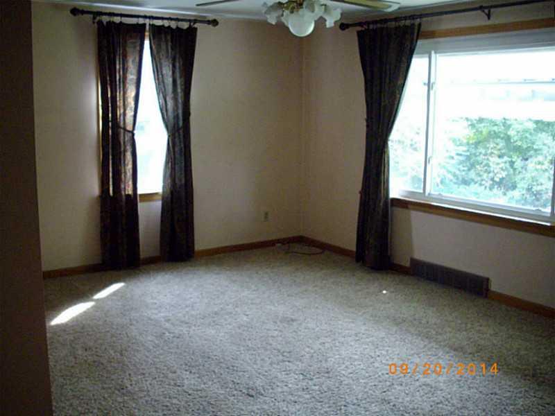 495 Amsler Ridge Road Economy, PA 15143 - Photo 12 of 24 Living Room. Newer carpeting, lots of light.