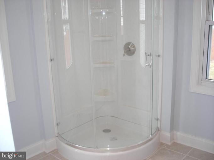 1220 Hilldale Road Rosedale, MD 21237 - Photo 12 of 19 a bathroom with a bathtub